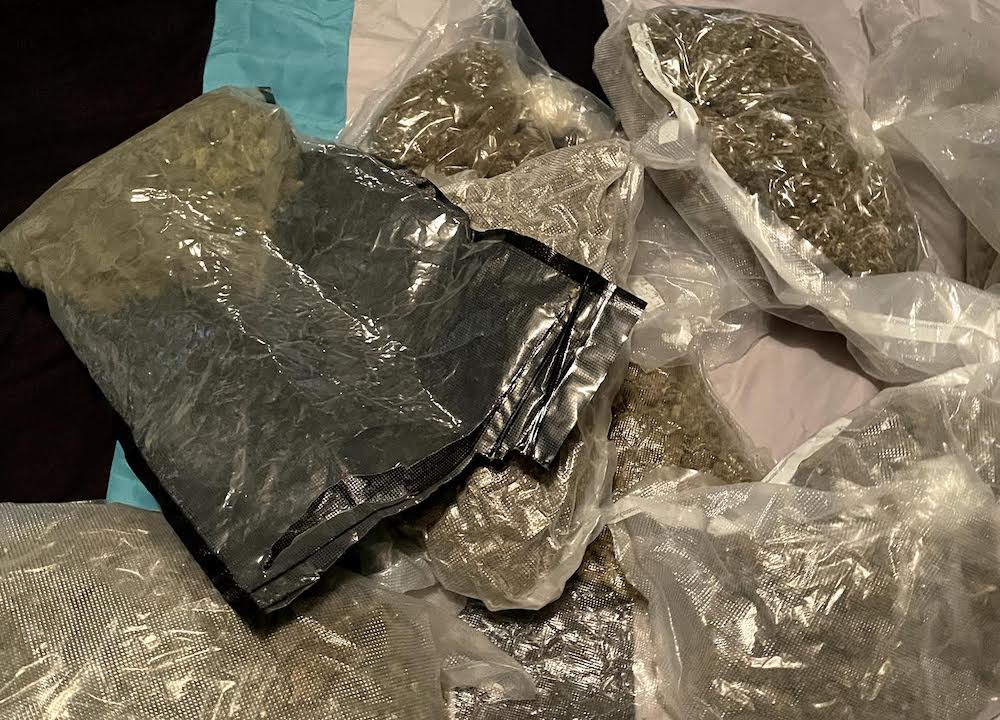 Bags of marijuana and cocaine discovered during warrant search of Bellaire Street home