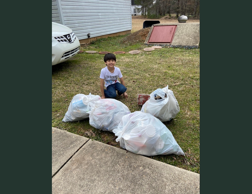 Local second grader takes action to help cleanup Warren