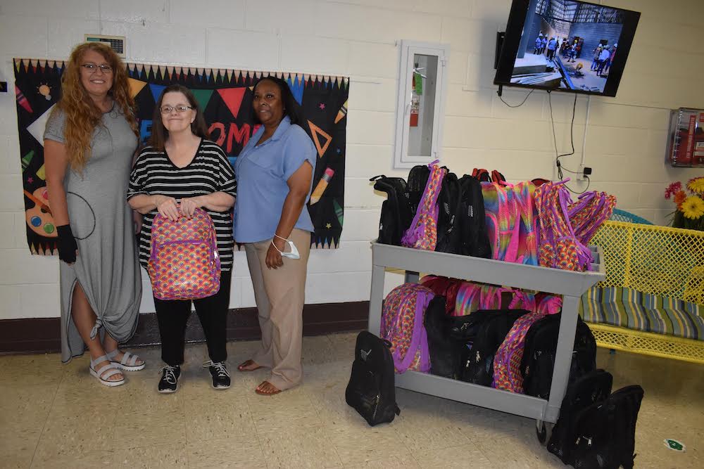 Chapel Woods donates school supplies to Eastside