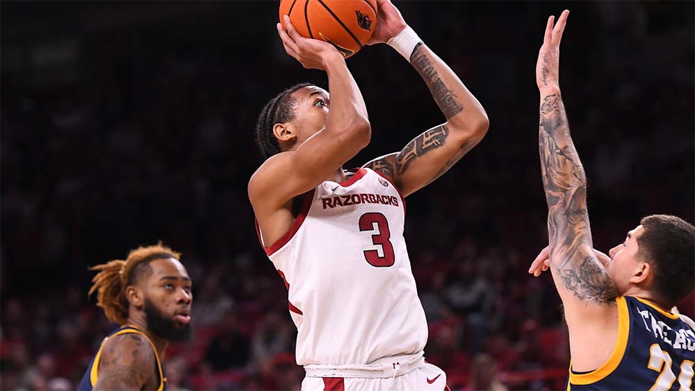 Arkansas pulls out win over UNCG
