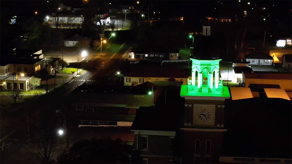 VIDEO-Take a flight around the Bradley County Courthouse bell tower lit up green for St. Patrick’s Day over the weekend