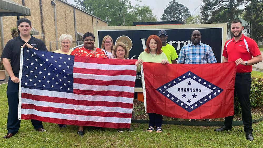 Warren School District receives donation of flags from Woodmen of the World Insurance Agency of Camden