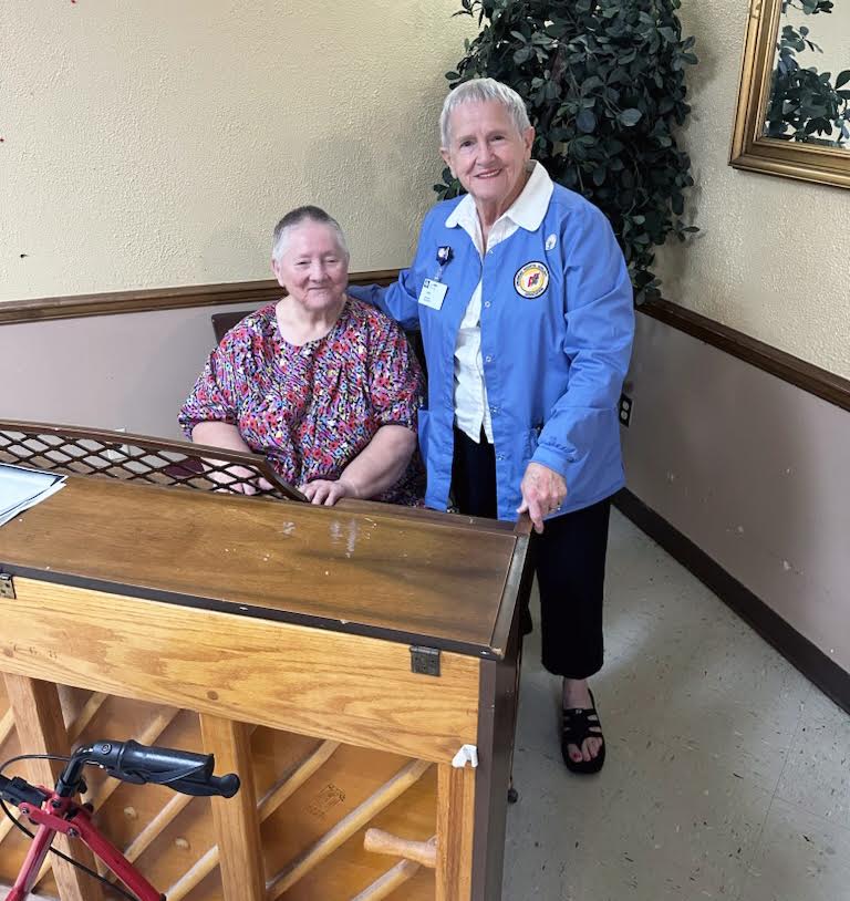 BCMC Auxiliary Member Linda Warrick sings to patients at Chapel Woods